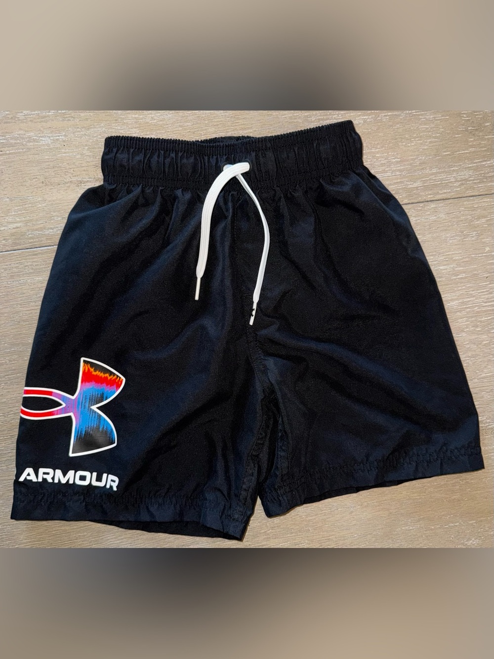 Under Armour Black Kids Swim Trunks with Multicolor UA Logo